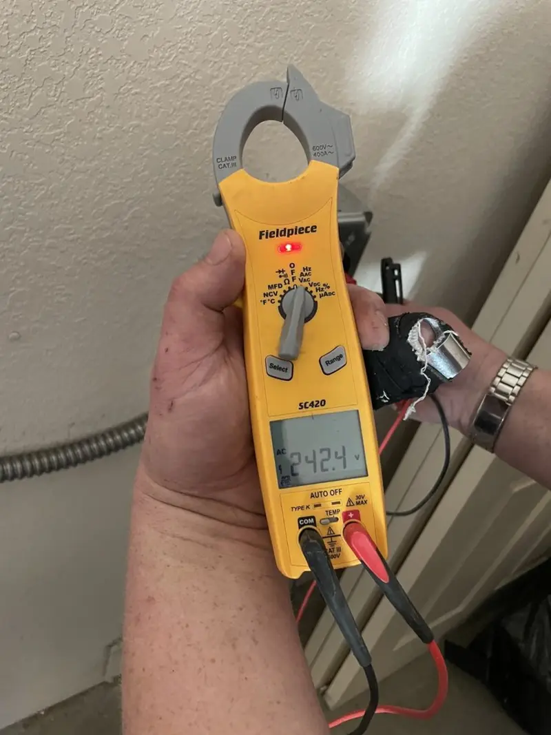 Voltage testing with clamp meter during Circuit Breaker Repair in Federal Heights